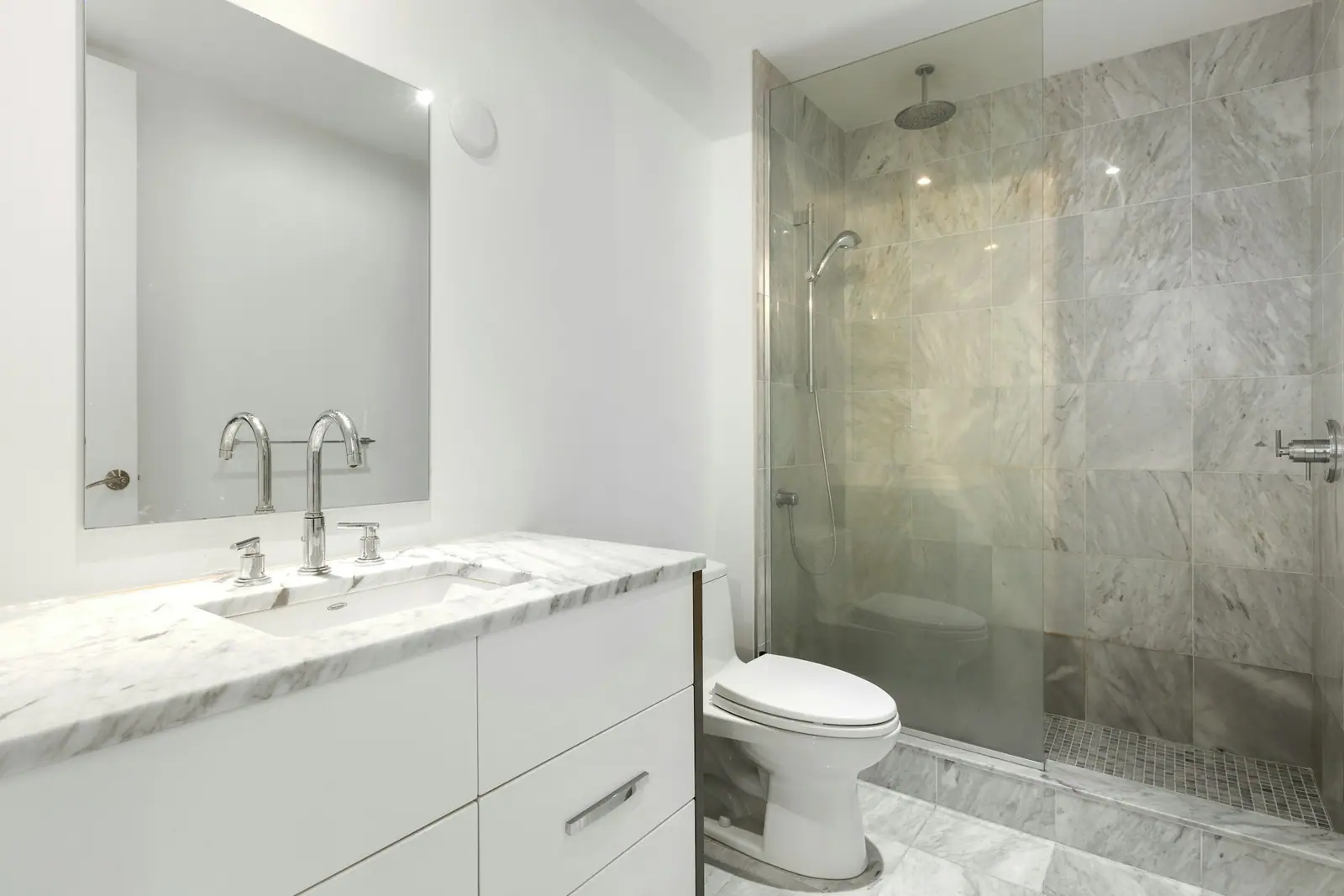 Primary bathroom with a glass shower enclosure