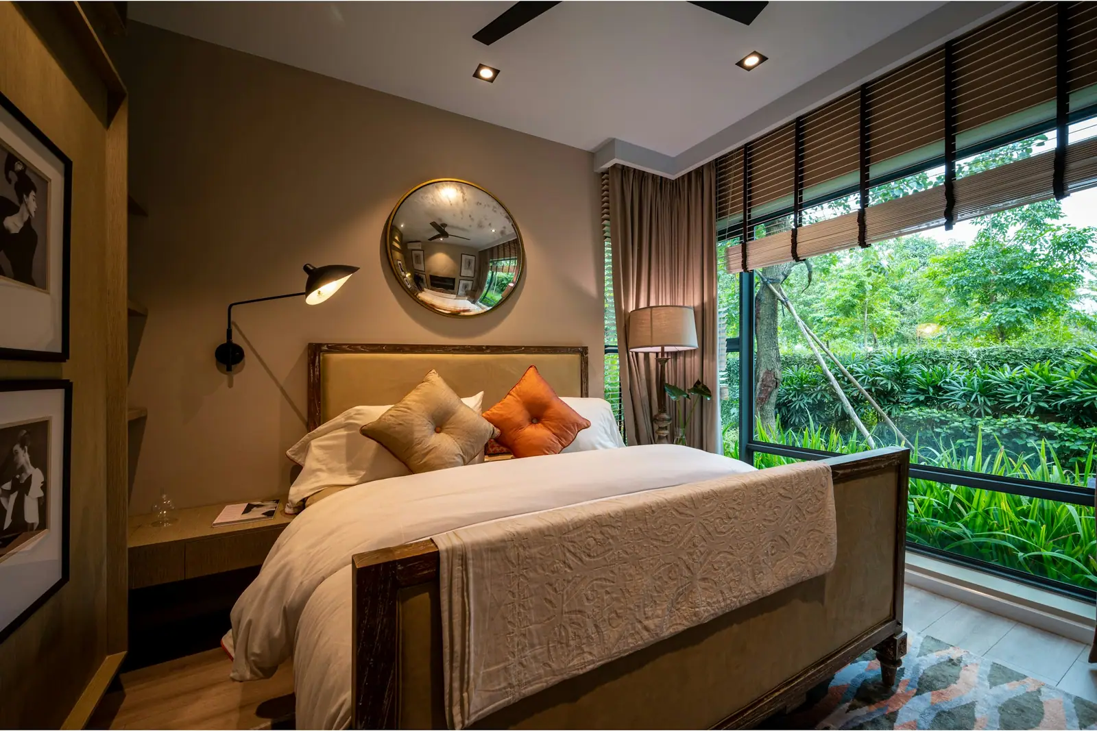 Furnished bedroom looking out on greenery